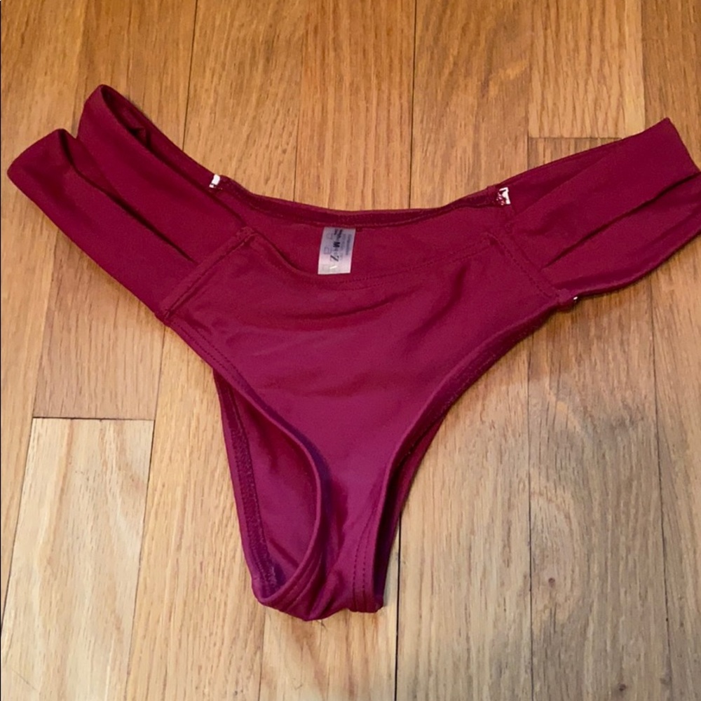 Maroon bikini bottoms.